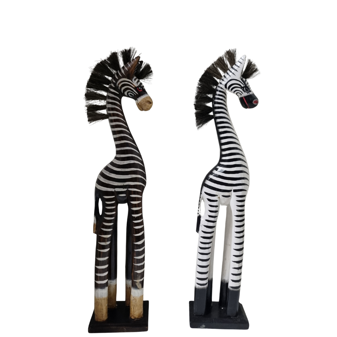 Two decorative zebra statues on a white background samples of the sets colour either brown-white or white black