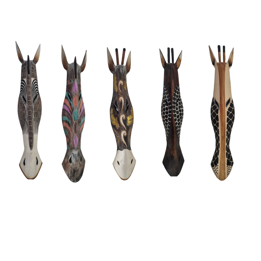 Handcrafted Wooden Giraffe & Zebra Masks Five decorative animal head sculptures with various patterns on a white background