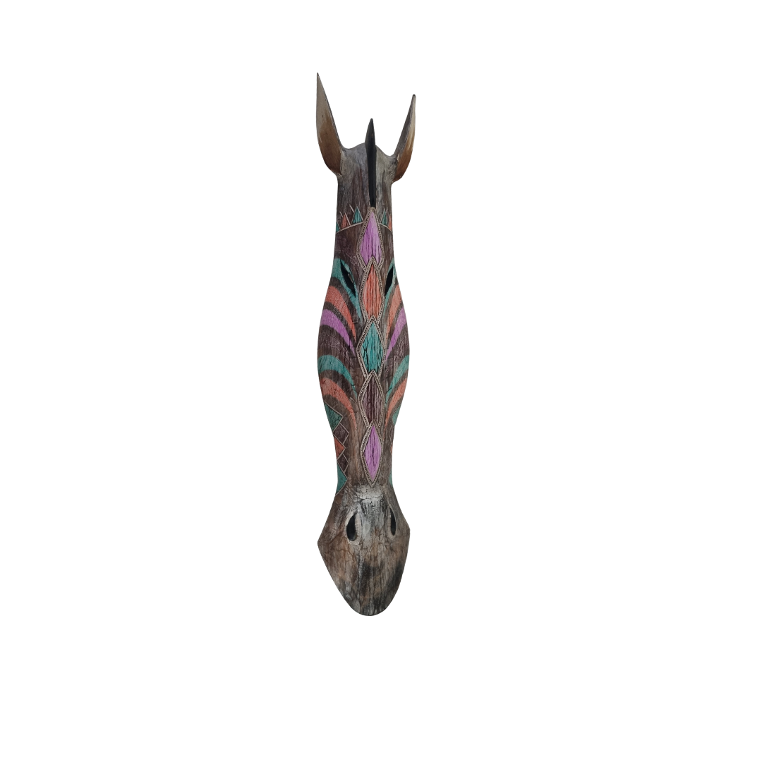 Decorative zebra head sculpture with colorful patterns on a white background