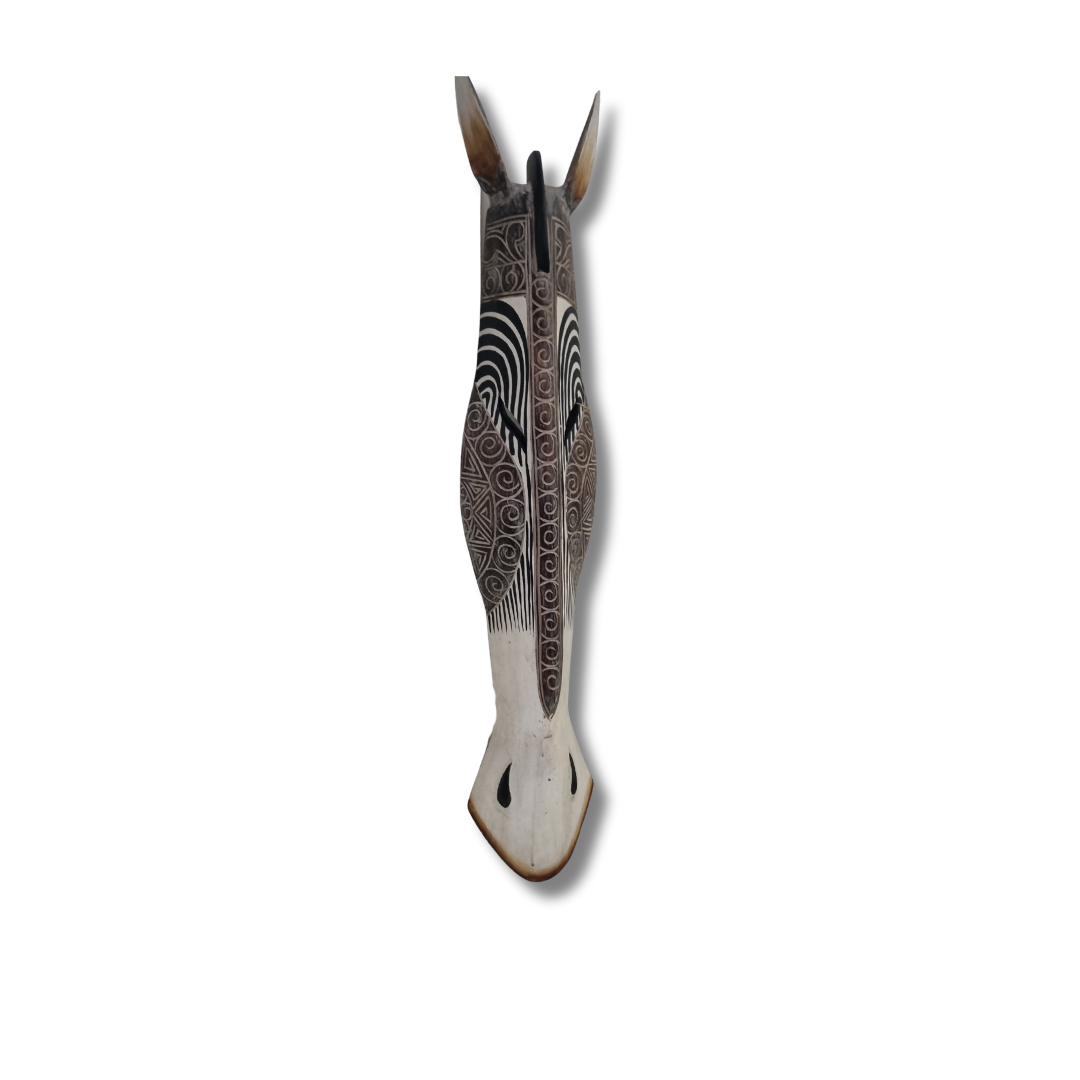 Decorative zebra wall mask  with intricate design on a white background