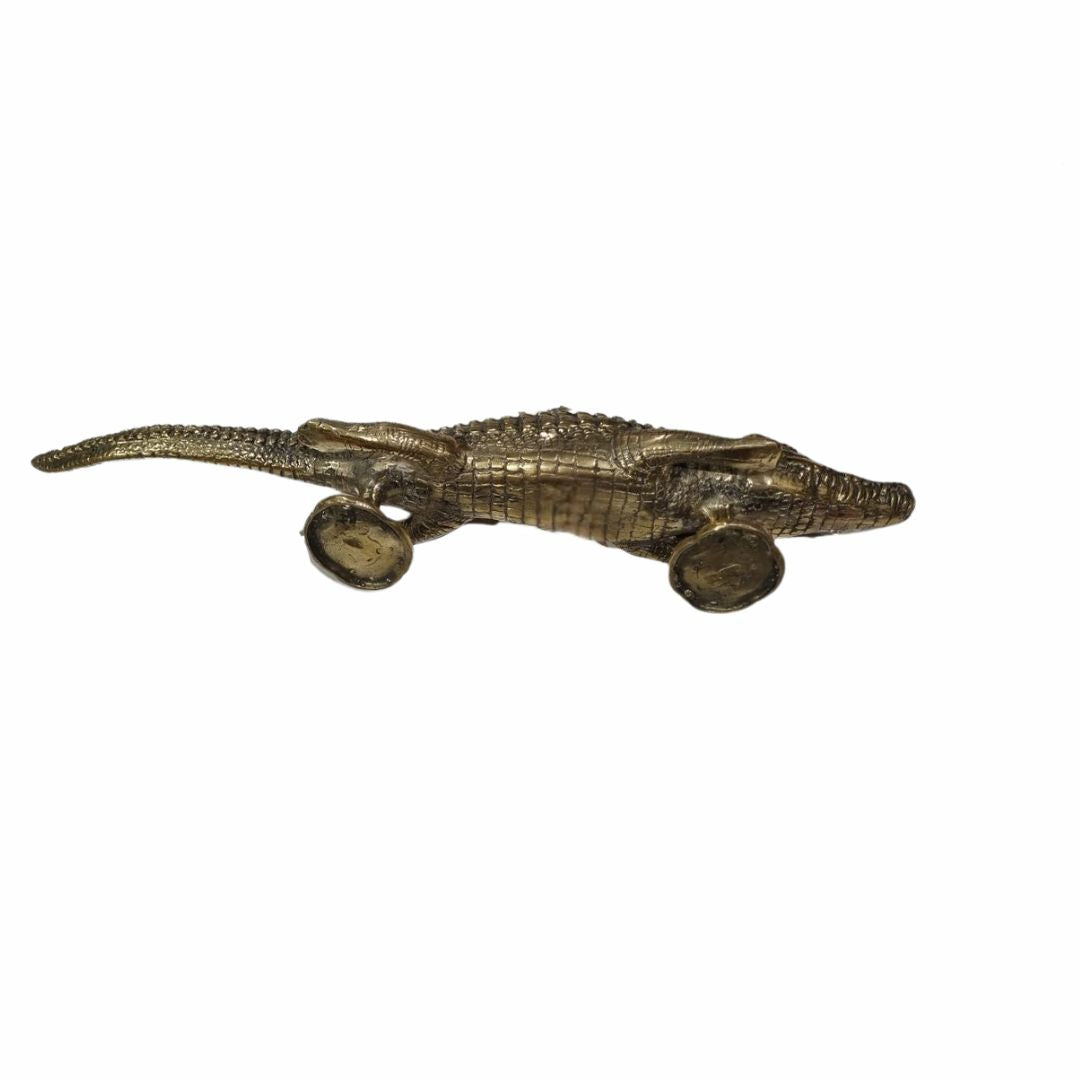 Decorative  Brass crocodile Door handle  figurine on wheels with a gold finish on a white background