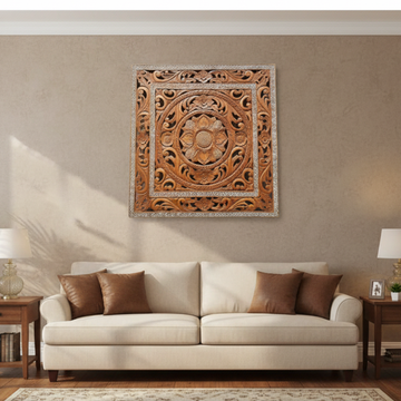 Decorative wall art above a beige sofa in a living room setting