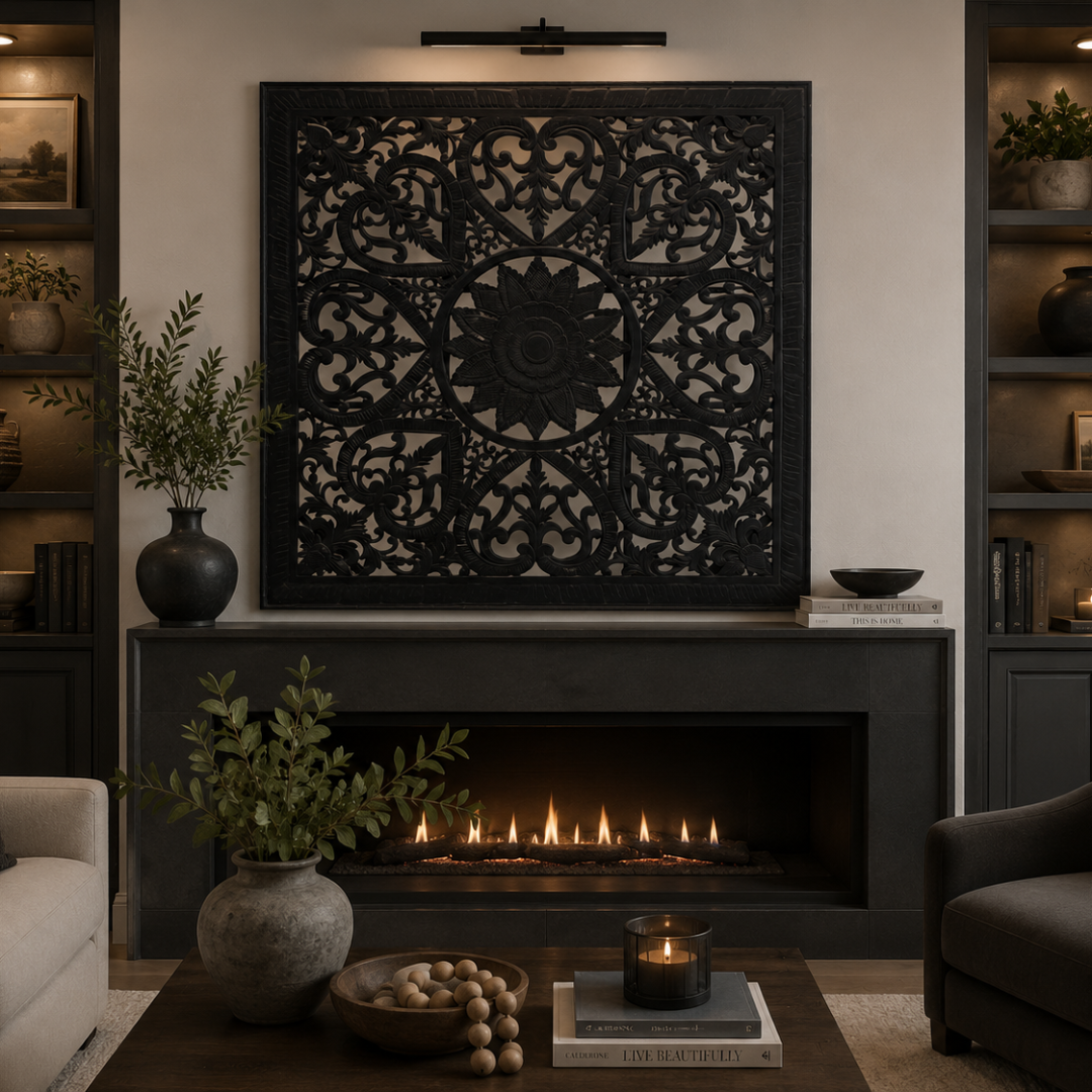 panel in black mounted above a modern gas fireplace in a moody living room with dark shelving and candlelight