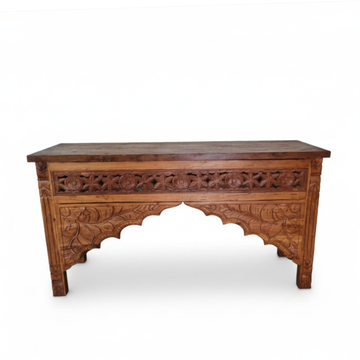 Teak Wood Console Table showing the intricate cavings deep bown tones on a white background