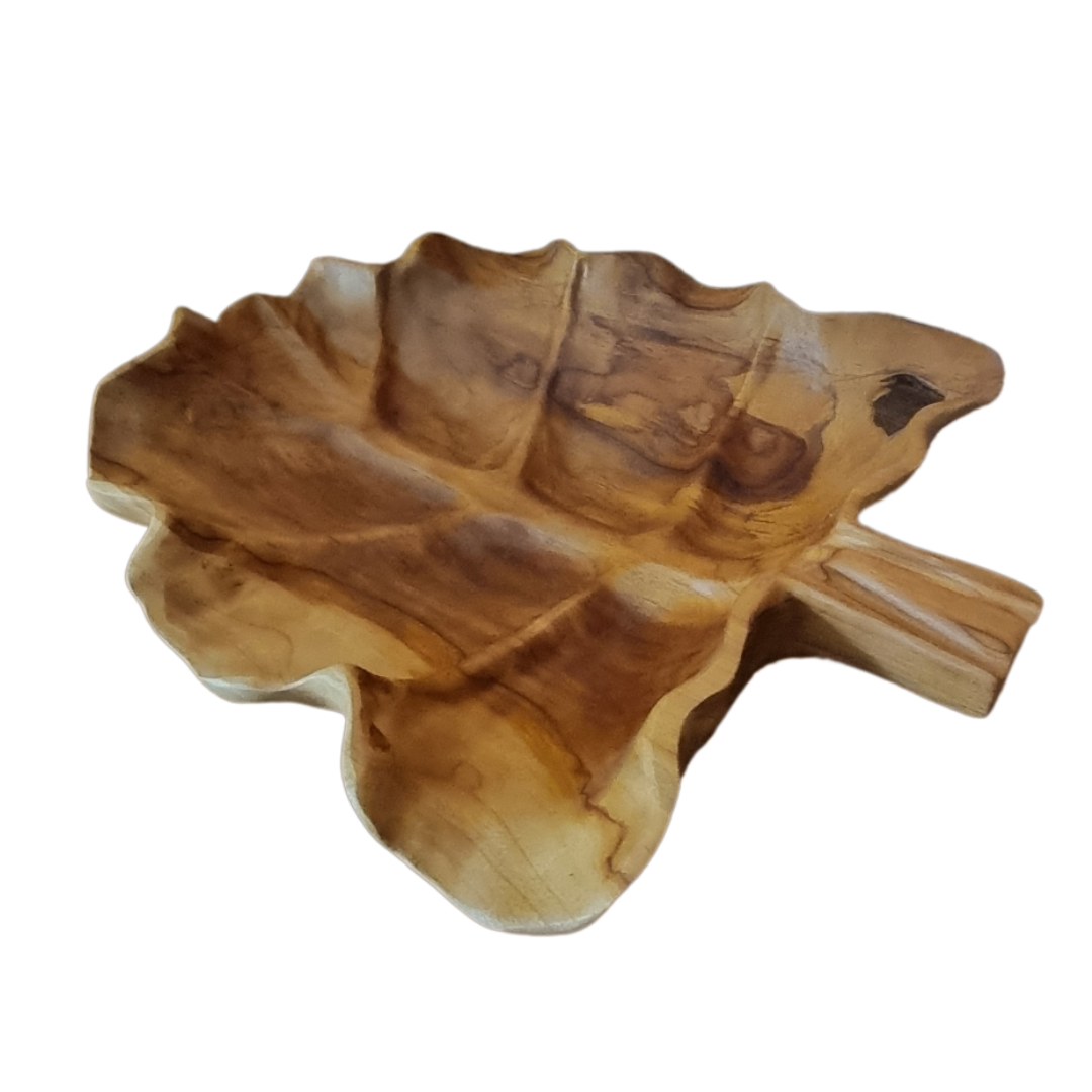 Wooden leaf-shaped bowl on a white background