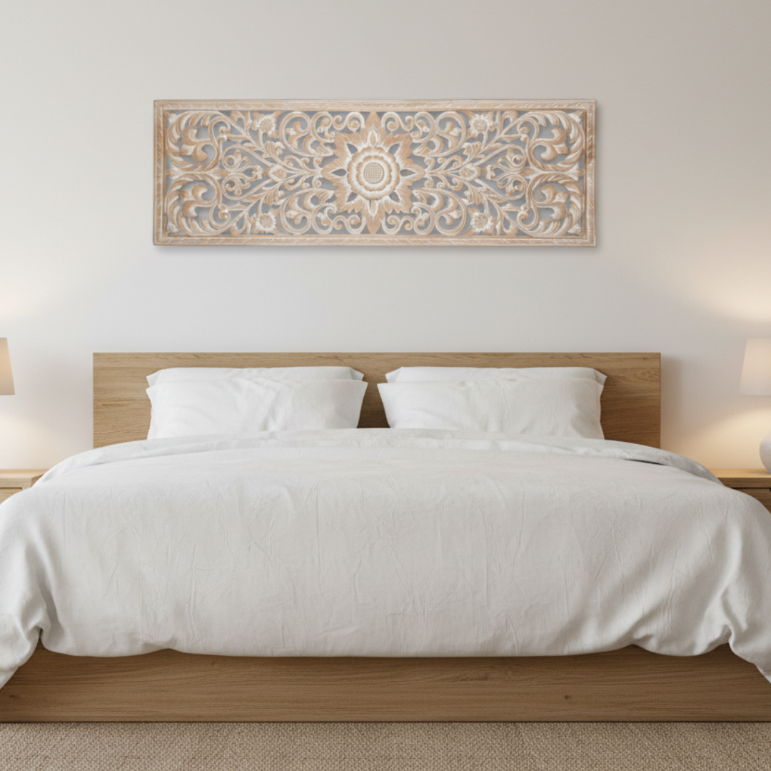  hung horizontally above a timber bed headboard in a serene white bedroom with white linen bedding and warm bedside lamps
