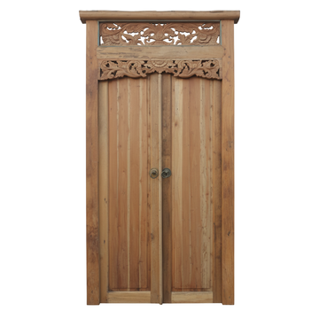 Balinese reclaimed timber double door with hand-carved floral frieze, lattice transom and brass ring handles on white background