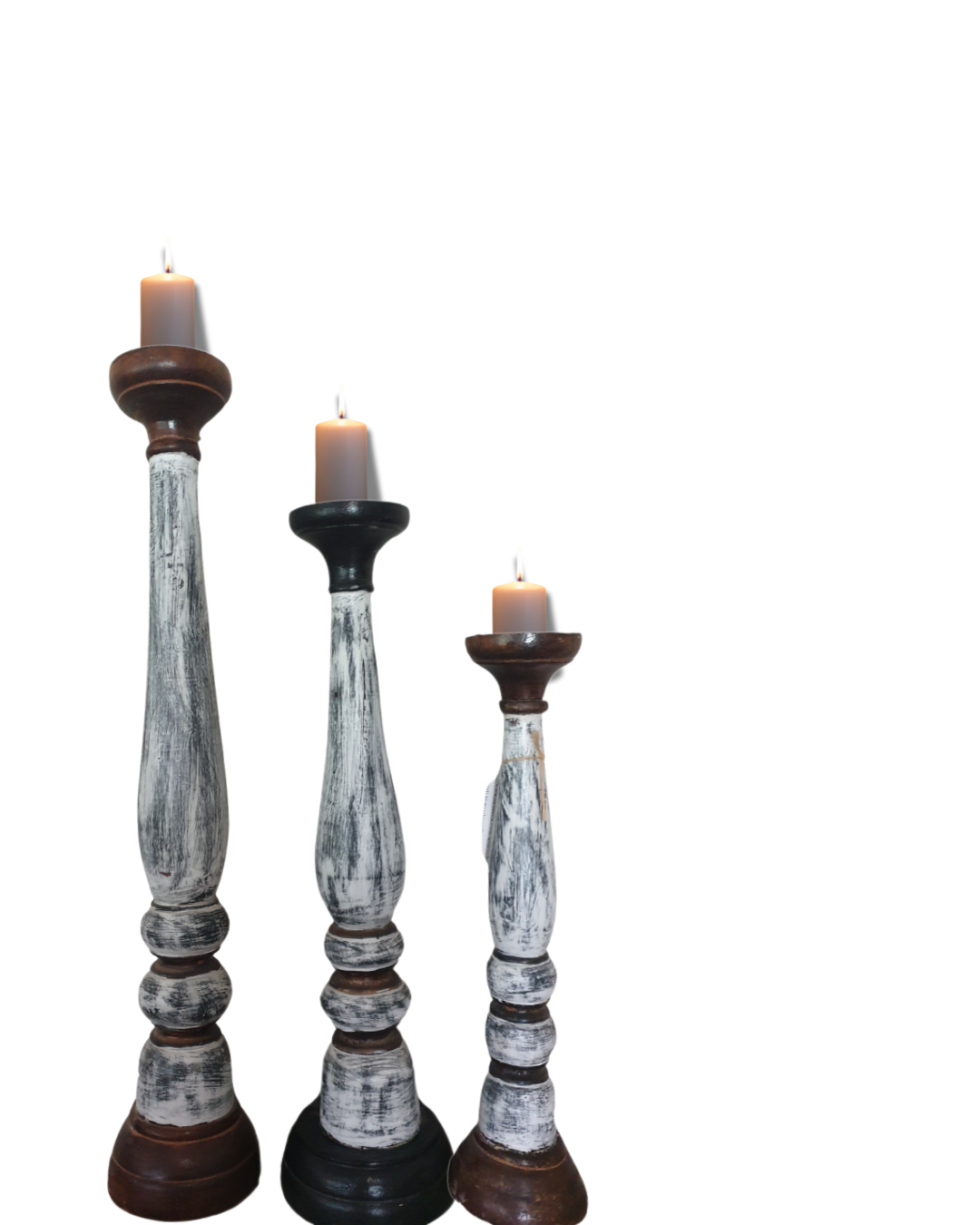 Three wooden candle holders with candles on a white background
