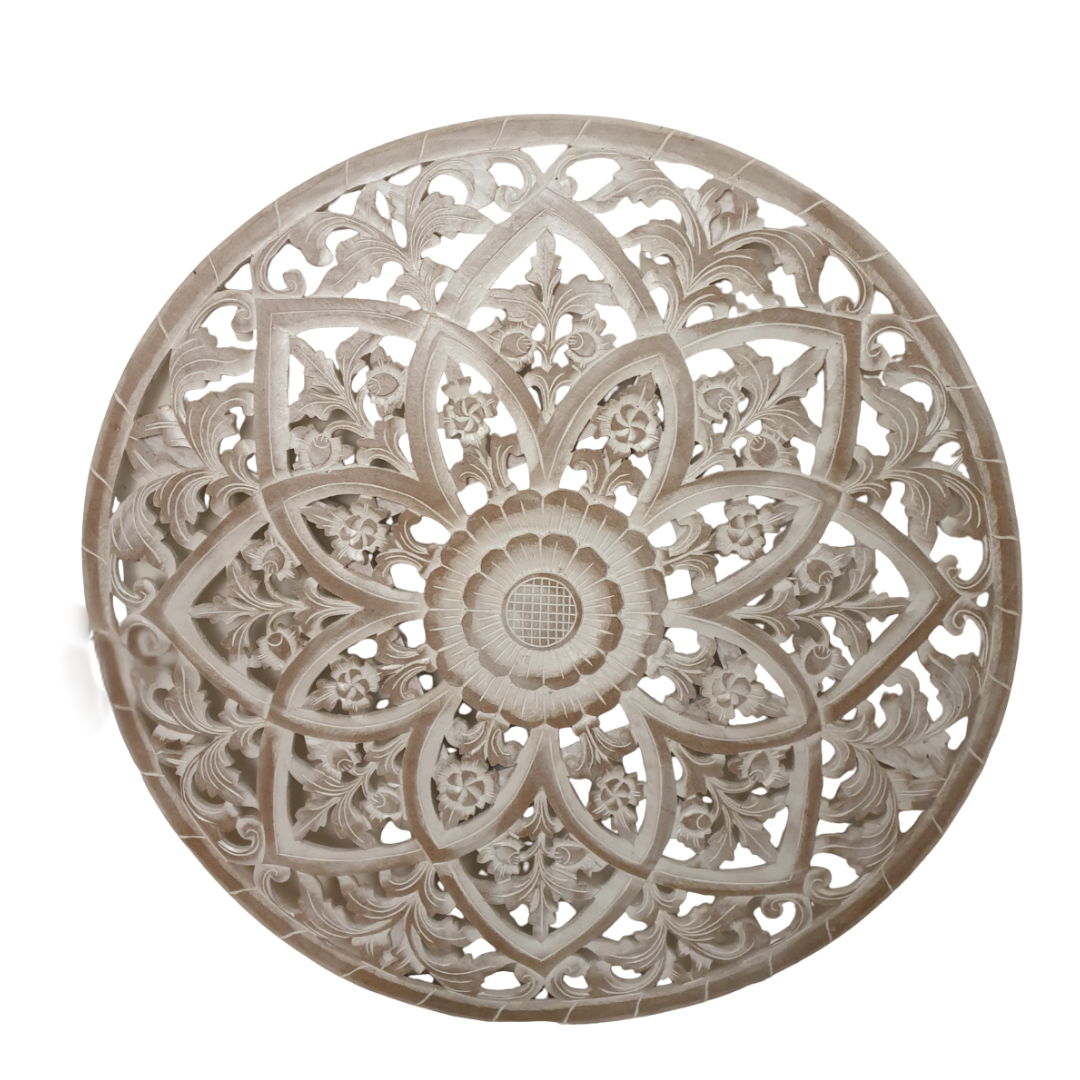 Decorative round wall art with intricate carvings on a white background