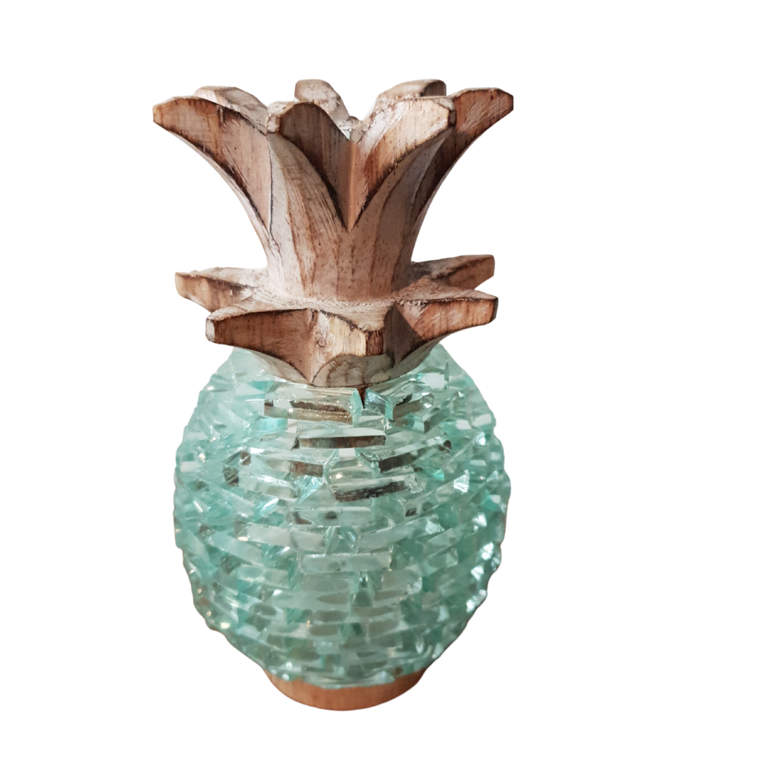 Front view of medium Boho Glass Pineapple Décor showing the intricate aqua sea-glass mosaic textured body and natural wood-tone carved wooden leaf top — handcrafted tropical boho tabletop sculpture 19cm x 11cm by Azure Decor
