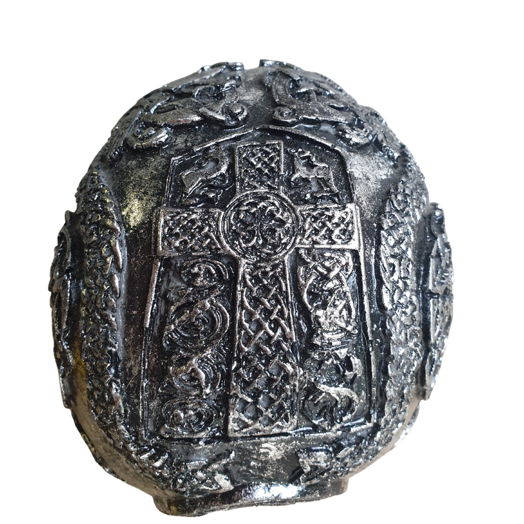 Top and back view of Boho Skull Art Tabletop Design in Silver, revealing a bold Celtic cross and intricate knotwork panels across the crown of the handcrafted resin skull, tabletop décor piece by Azure Decor
