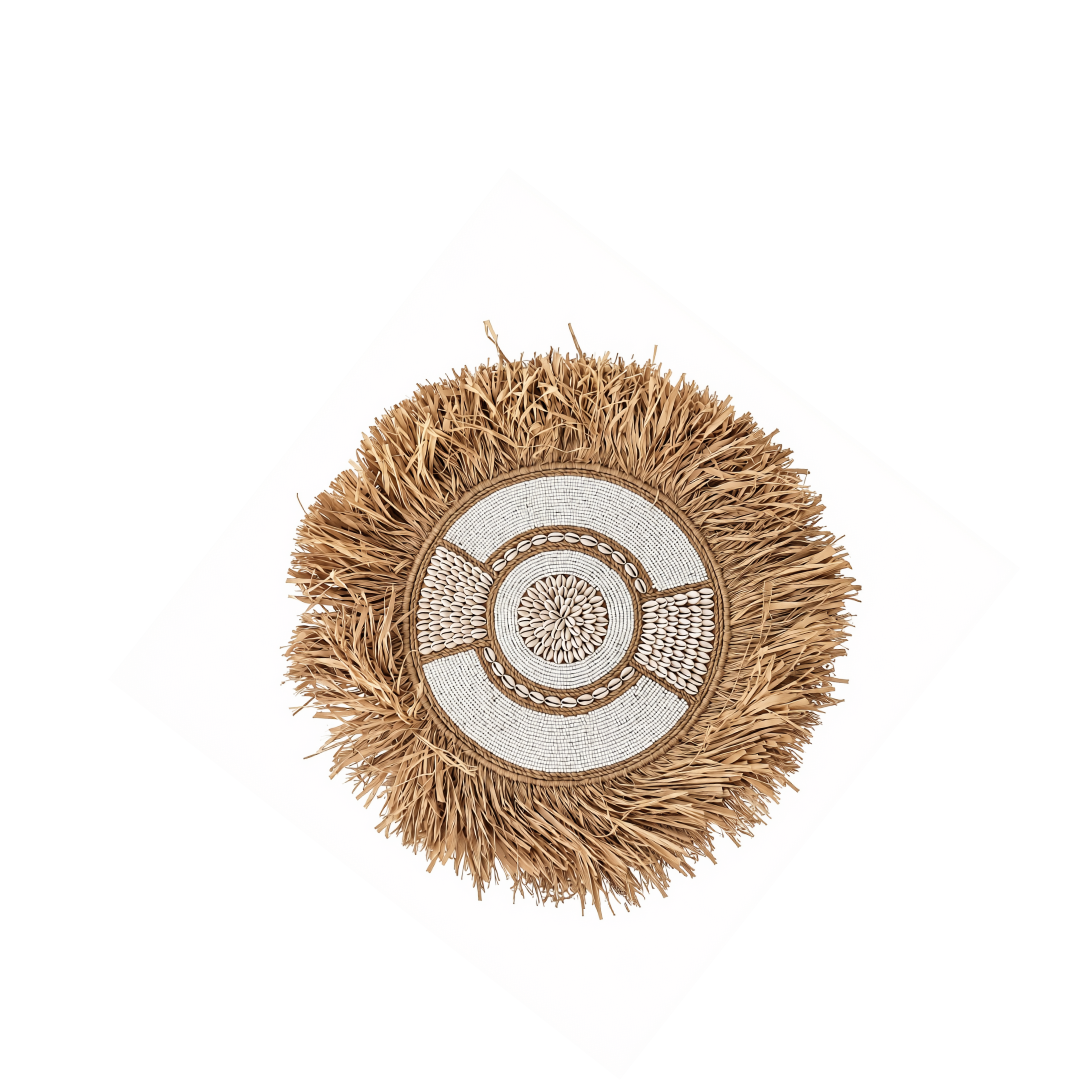 Medium 50 cm circular boho style wall art made with seagrass, beads and shells in natural beige and white, against a white background.
