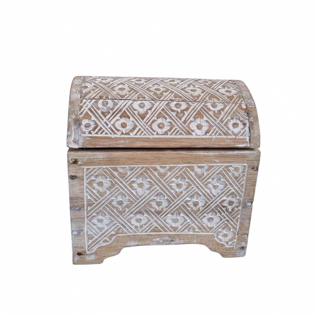 White wash carved wooden trinket chest with domed lid and floral diamond pattern carvings, white background