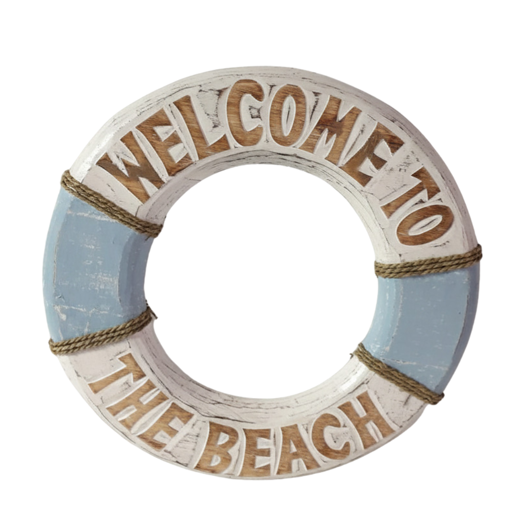 Round ring-shaped wall hanging with Welcome to the Beach lettering in blue and white with rope detailing