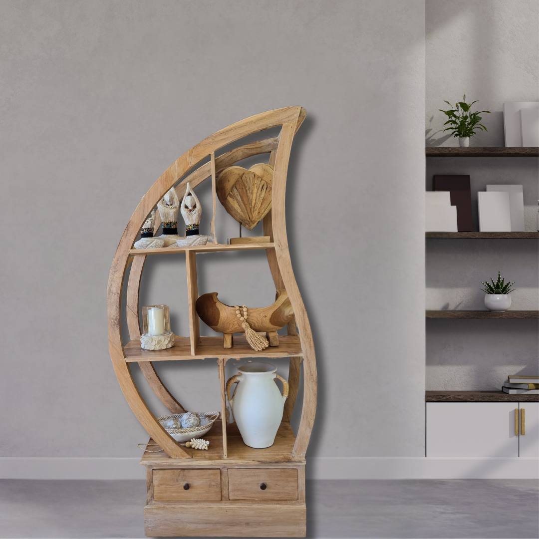 Wooden curved shelf with decorative items against a gray wall.
