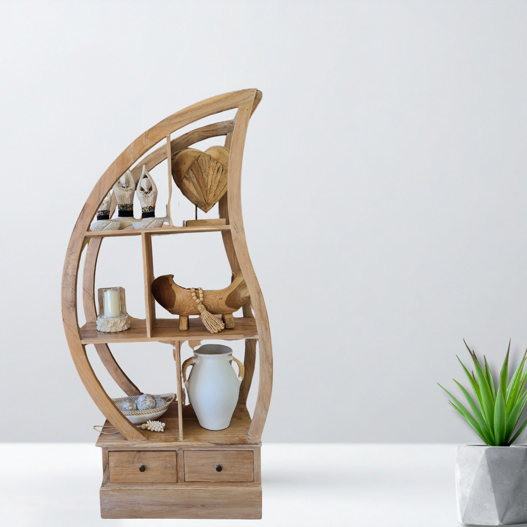 Wooden shelf with decorative items against a white background
