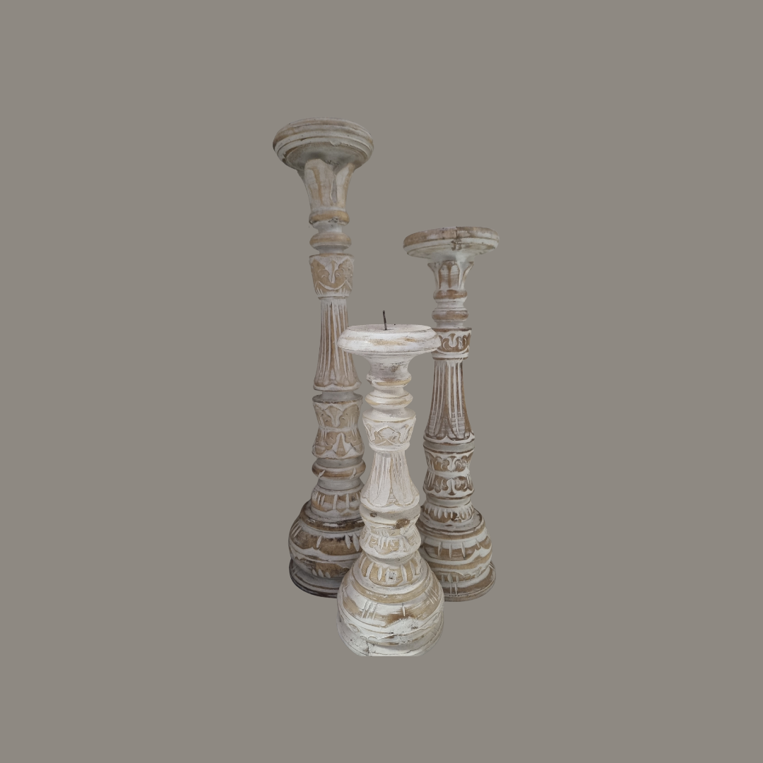 Decorative candle holders on a gray background