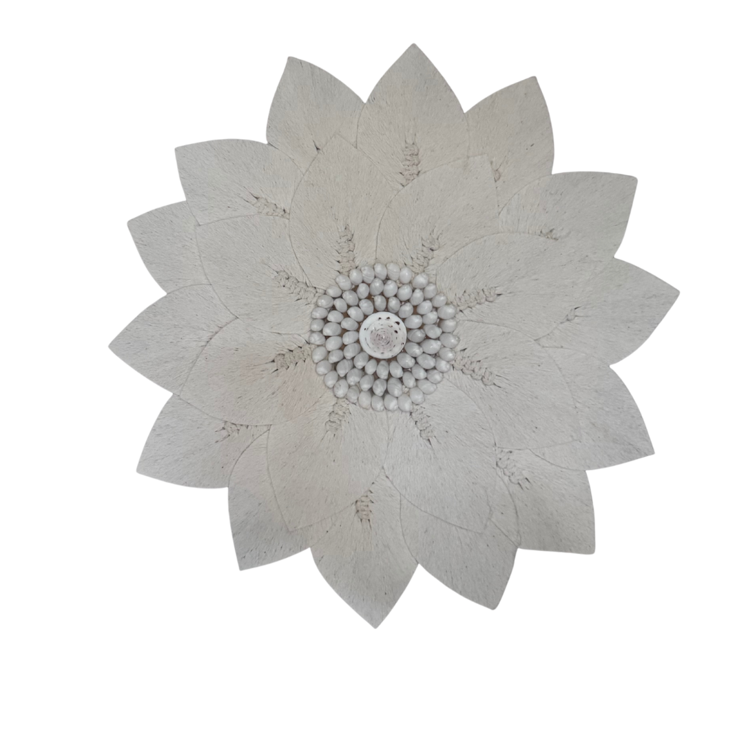 macrame Decorative wall piece with a floral and shell design on a white background