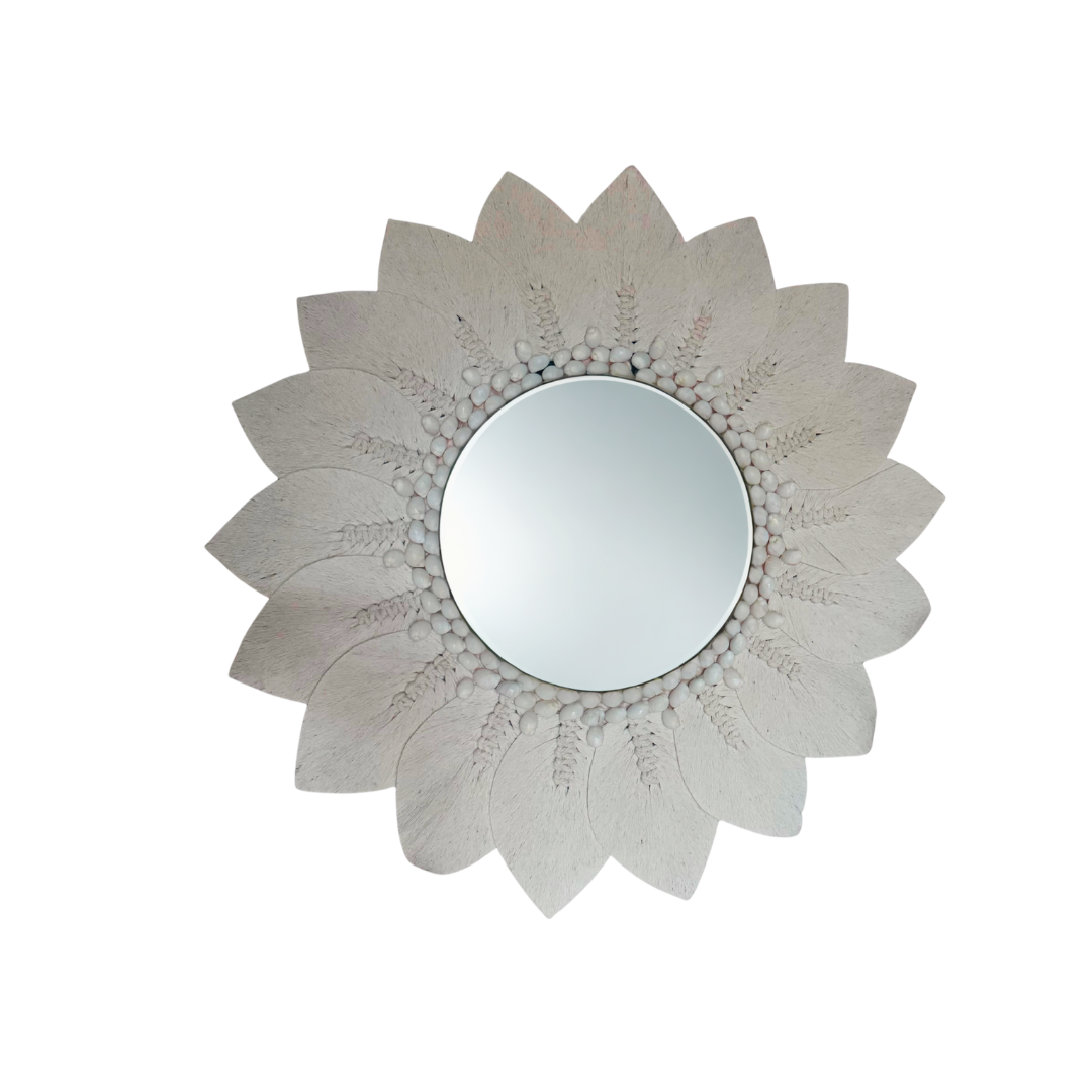 macrame Decorative wall mirror with floral design on a white background