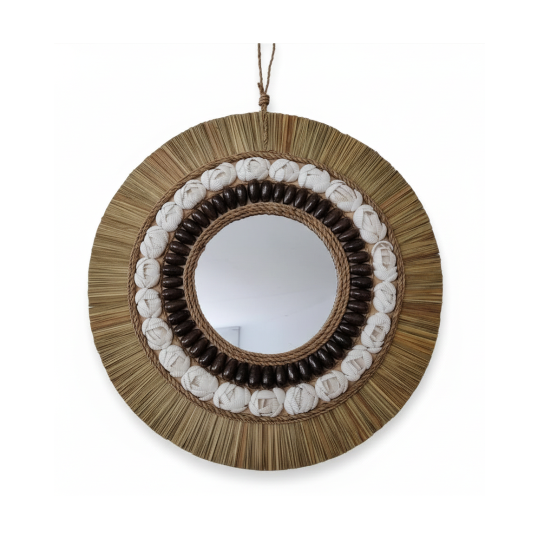 Round mirror with natural wood and shell design on a white background