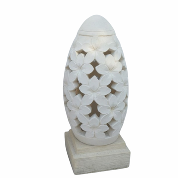 Frangipani Motif concrete garden lantern from the Dome Collection – handcrafted in Bali with layered frangipani flower cutouts on a square base, in neutral cream