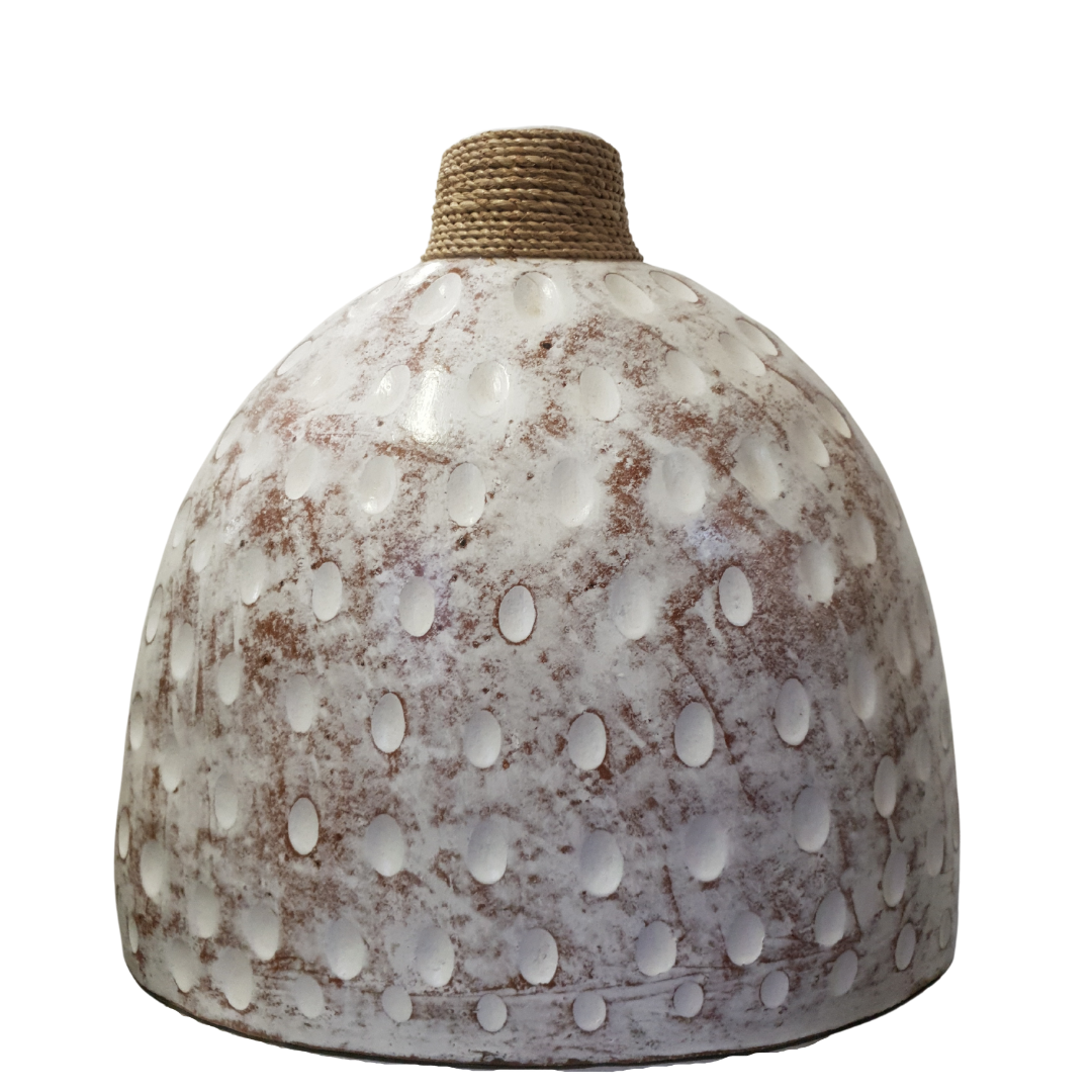 A ceramic table top vase with a black and white wash finish and a jute rope detail on the top.