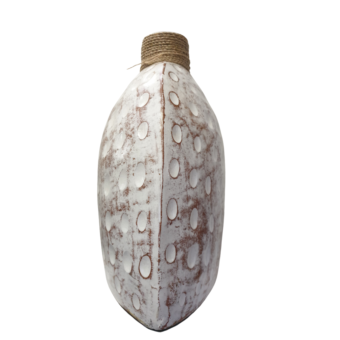 A ceramic table top vase with a whitewash and white wash finish and a jute rope detail on the top.