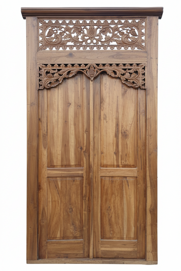 Wooden door with intricate carvings on a white background