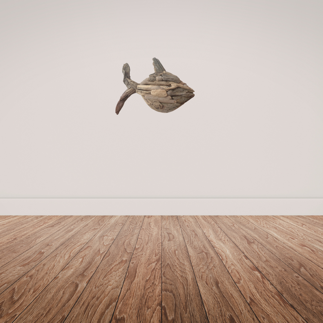 Driftwood sculpture on a plain background