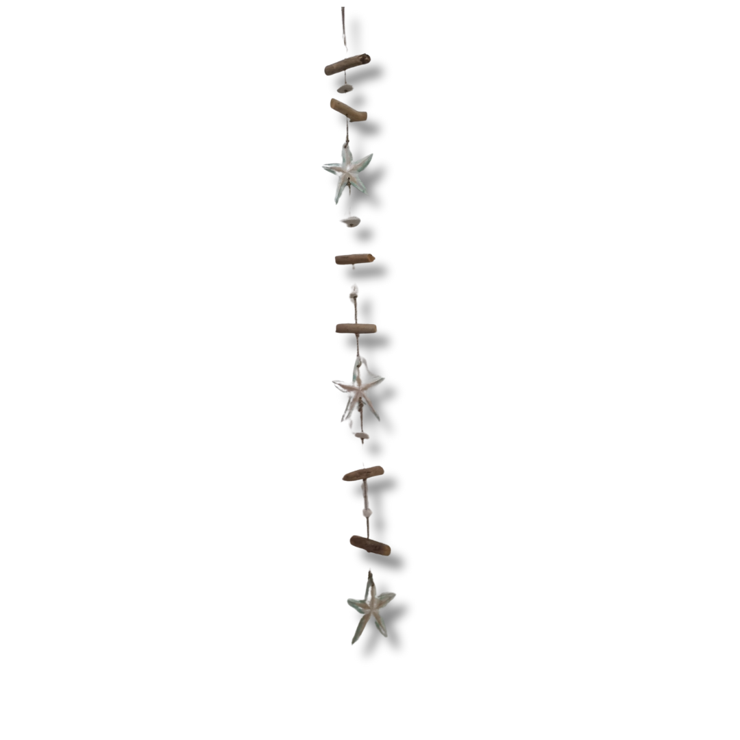 star fish driftwood wall art hanging on white wall