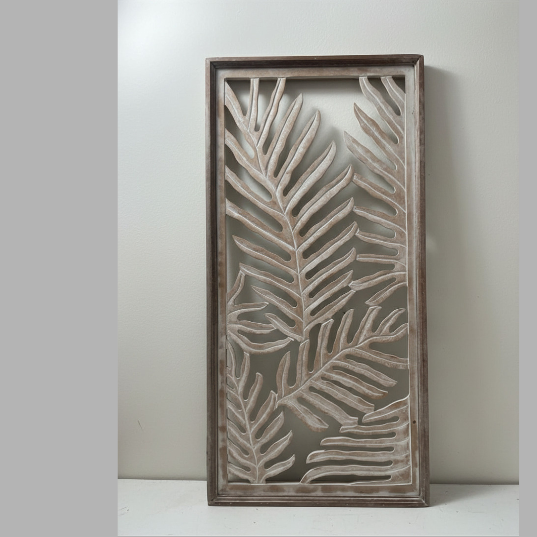 Side profile of natural wash framed cutout leaf décor showing panel thickness and hanging hook