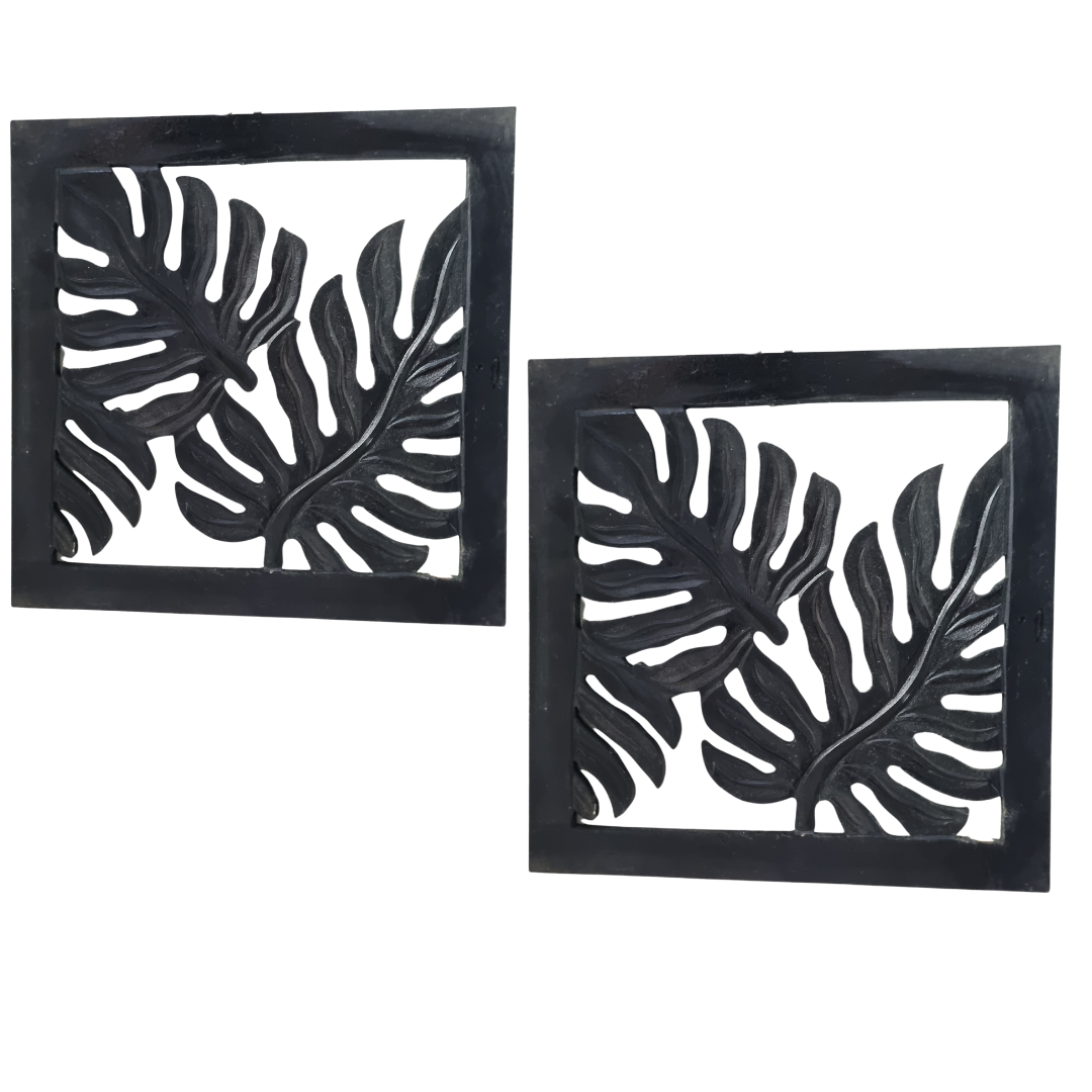 Two Black Fern Wall Art MDF panels with tropical fern leaf design on a white background.