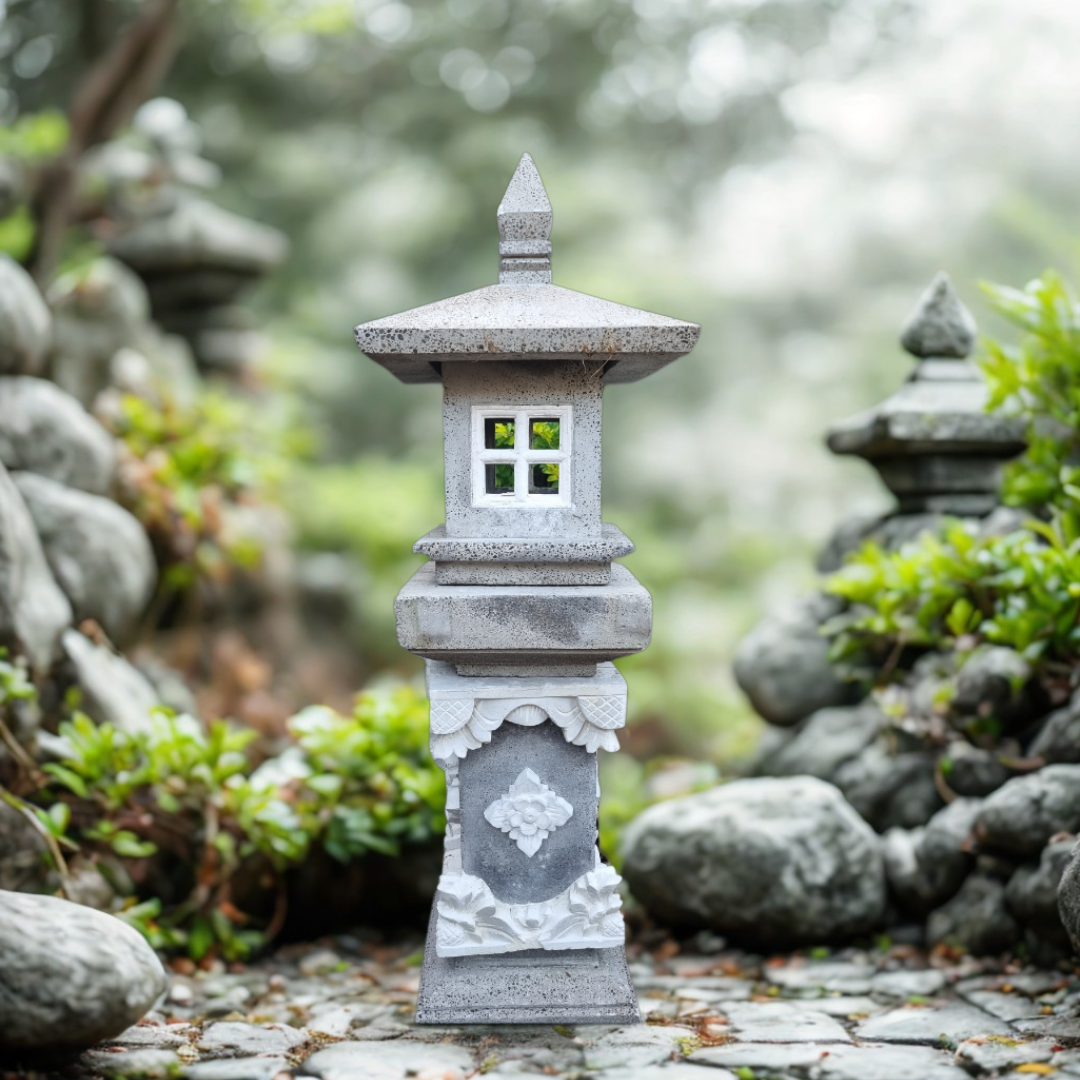 Stone lantern in a garden setting with rocks and greenery