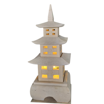 Garden Pagoda Limestone Carving with warm glowing windows, three-tier handcrafted design on decorative base