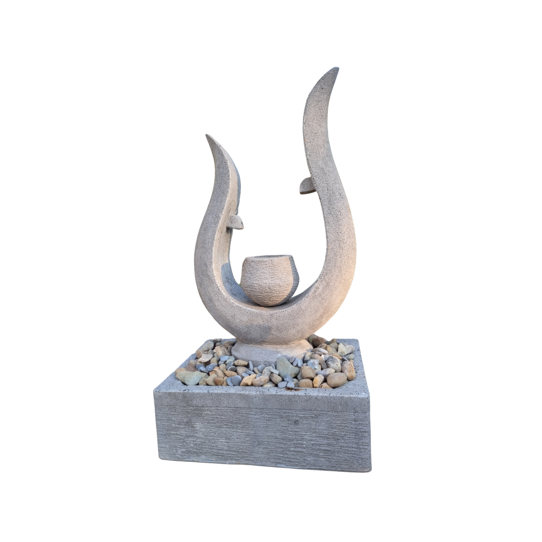 Decorative stone sculpture with curved design on a white background