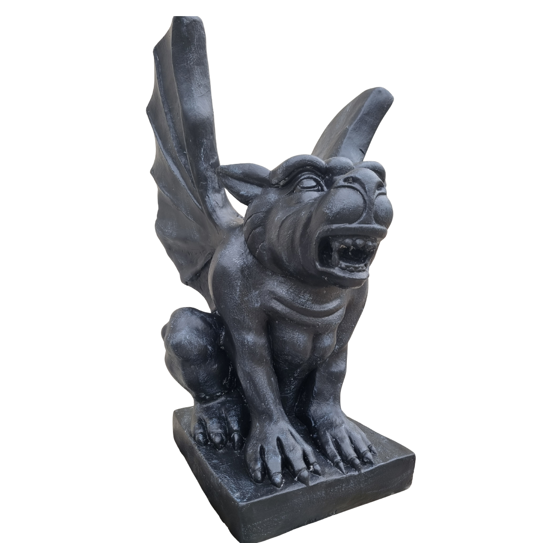 Statue of a gargoyle on a white background