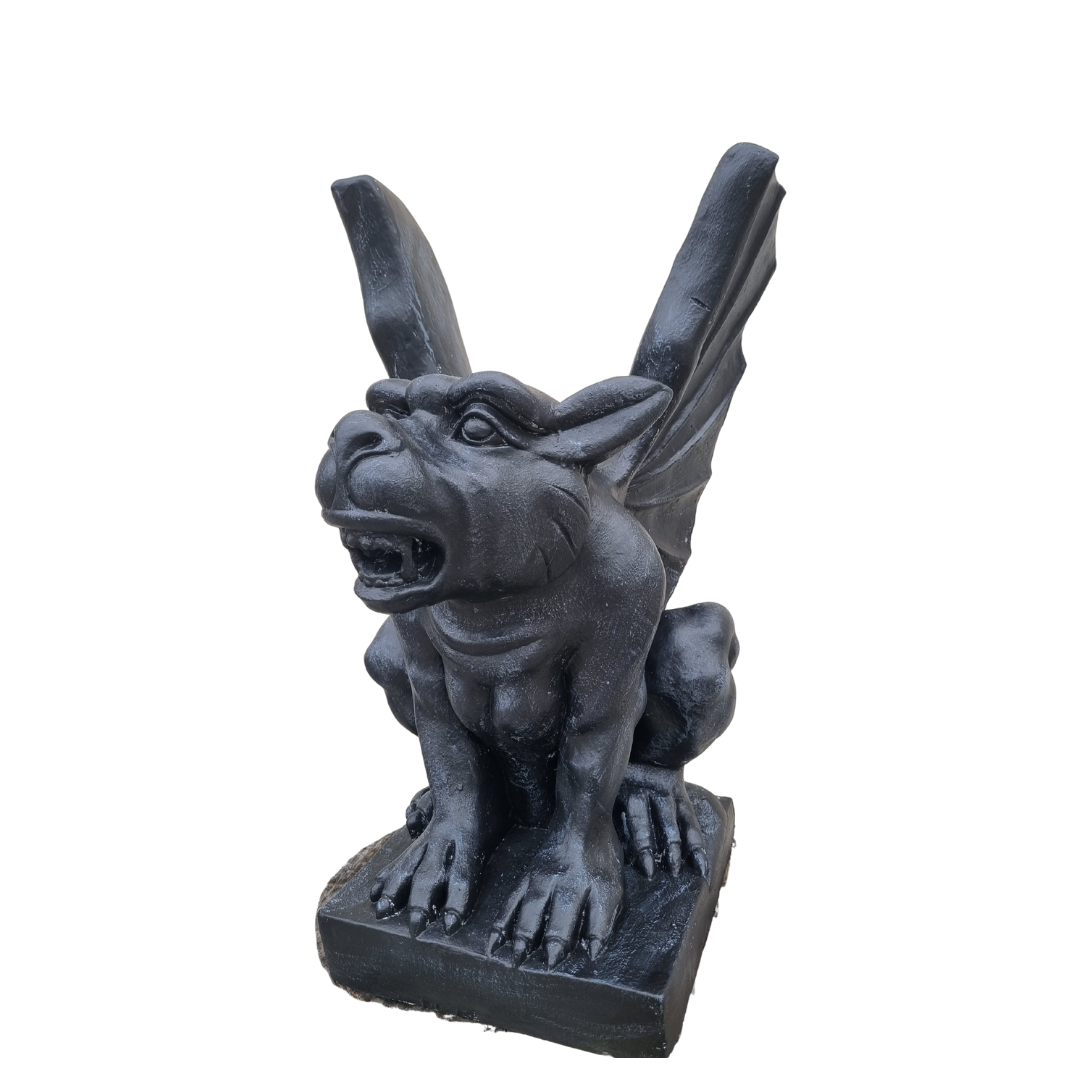 Black gargoyle statue on a white background