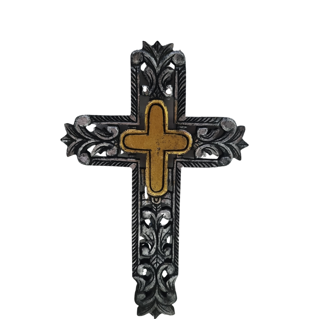 Decorative cross with intricate patterns on a white background
