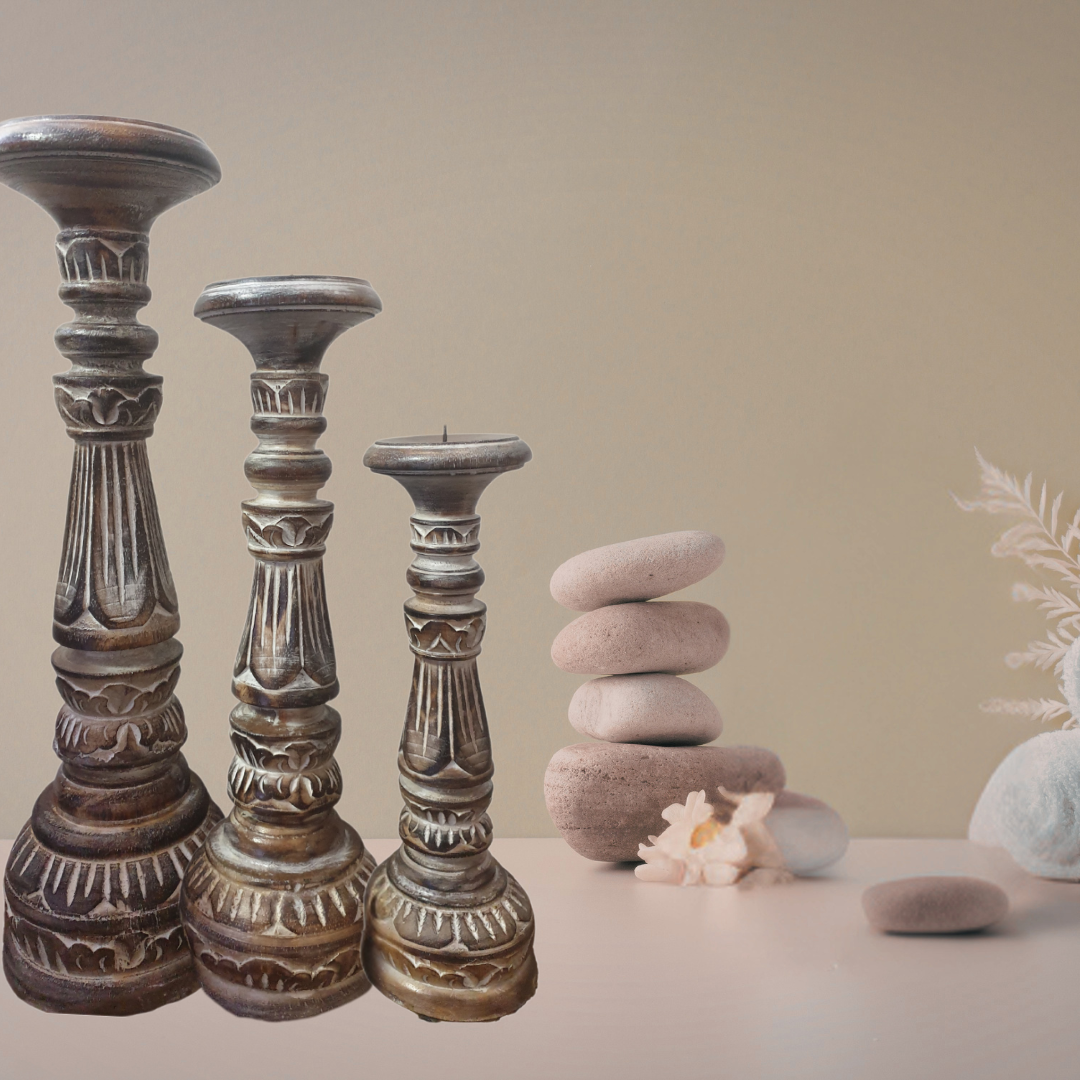 Brown wash hand-carved wooden candle holder set of 3 styled with stacked stones and botanicals – rustic boho home décor Australia