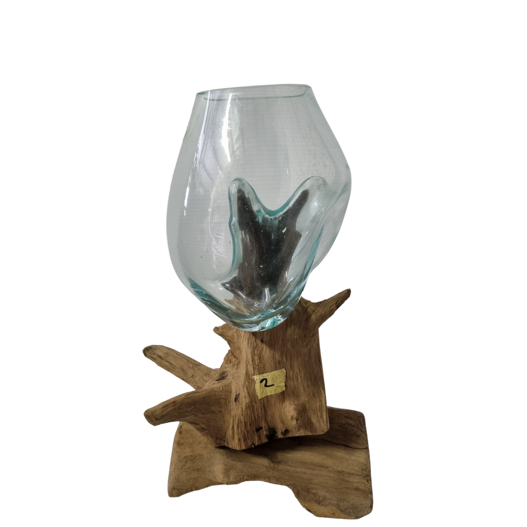 glass bowl on natural wood scultpture 