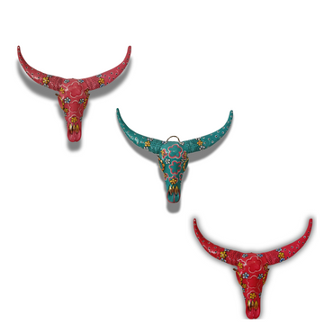 Handcrafted Floral Resin Bull Skull wall art in three vibrant colours — Light Pink, Turquoise, and Red — each featuring intricate floral patterns and decorative detailing, 45cm x 25cm