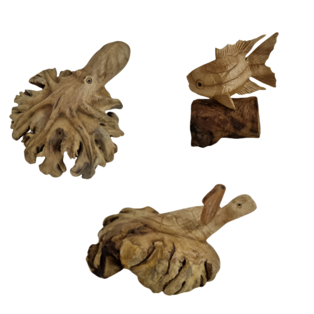 Three wooden fish figurines on a white background