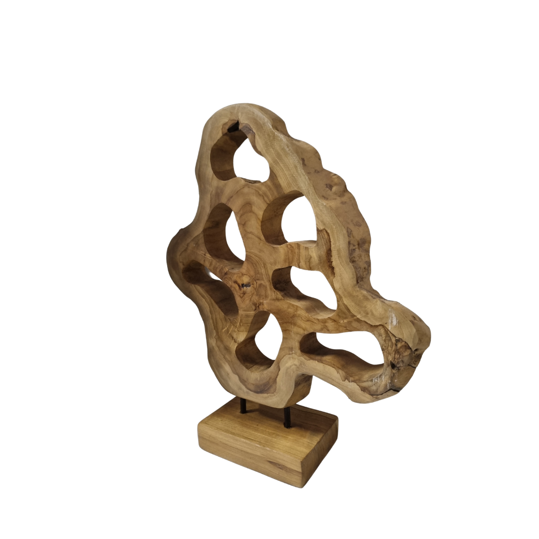 A handcrafted teak wood table top sculpture with intricate carvings, mounted on a wooden base.