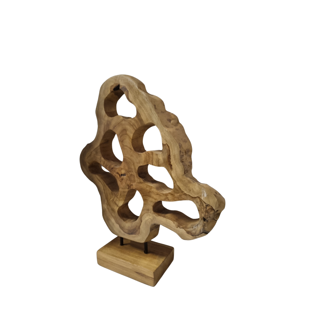 A handcrafted teak wood table top sculpture with intricate carvings, mounted on a wooden base.