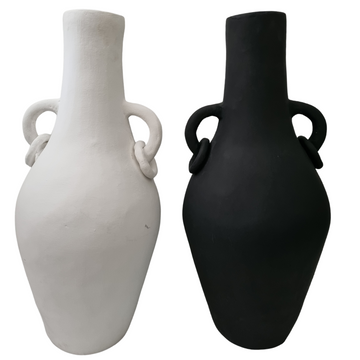 all matte black or white terracotta vase with looped ring handles on a white background
