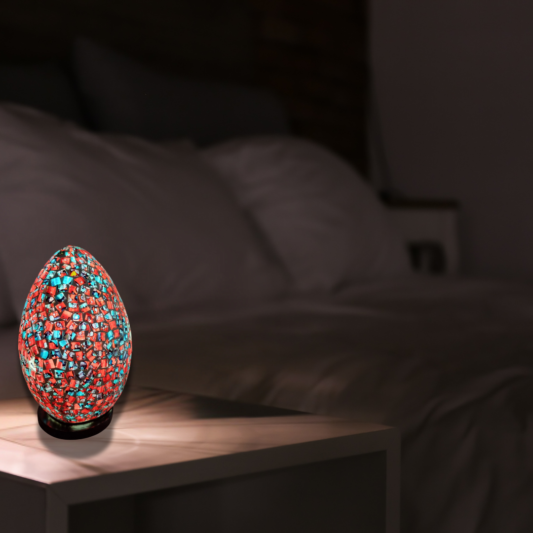 Two oval mosaic art lamps in multicolor, with a geometric pattern, designed for home decor.