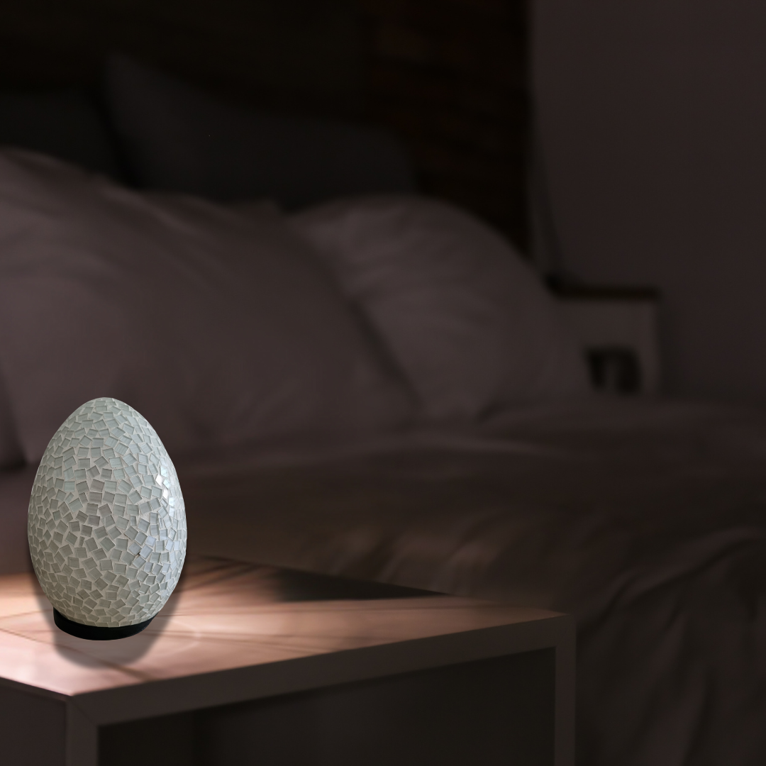 Two oval mosaic art lamps in multicolor, with a geometric pattern, designed for home decor.