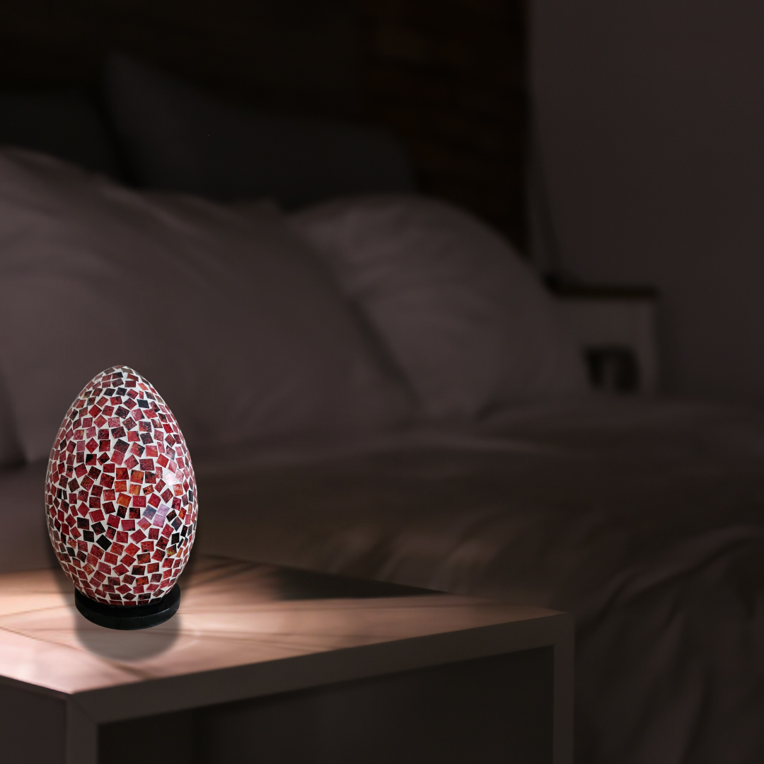 Two oval mosaic art lamps in multicolor, with a geometric pattern, designed for home decor.