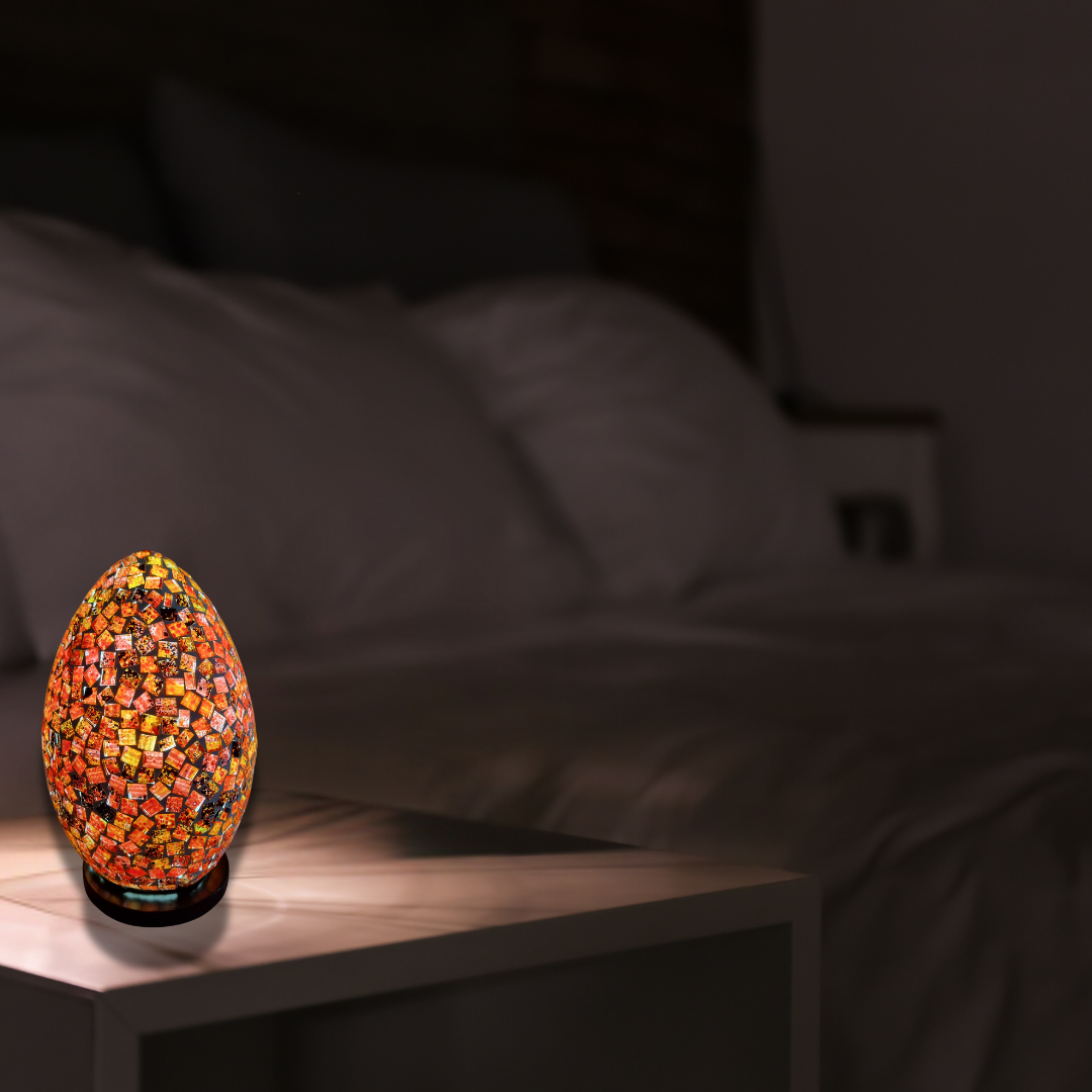 Two oval mosaic art lamps in multicolor, with a geometric pattern, designed for home decor.