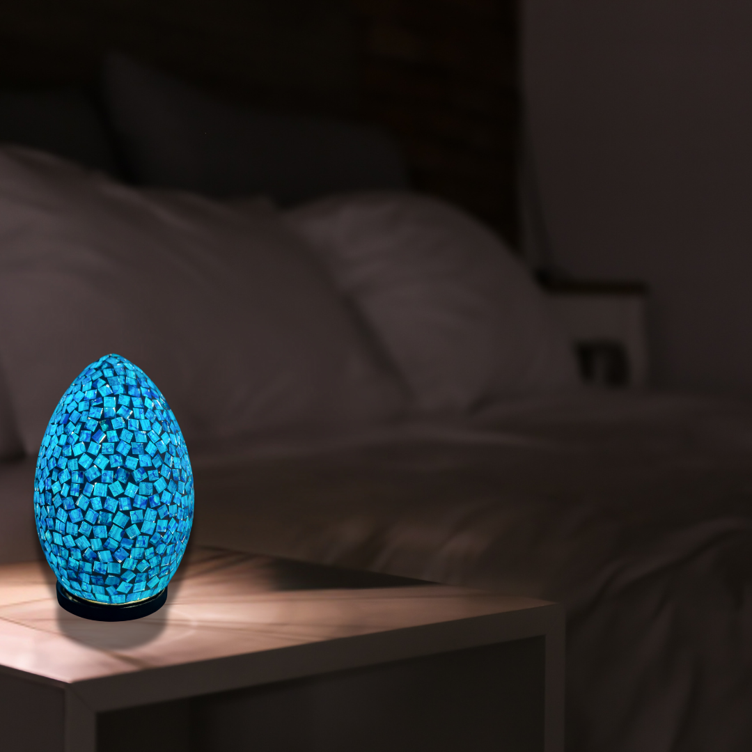 Two oval mosaic art lamps in multicolor, with a geometric pattern, designed for home decor.